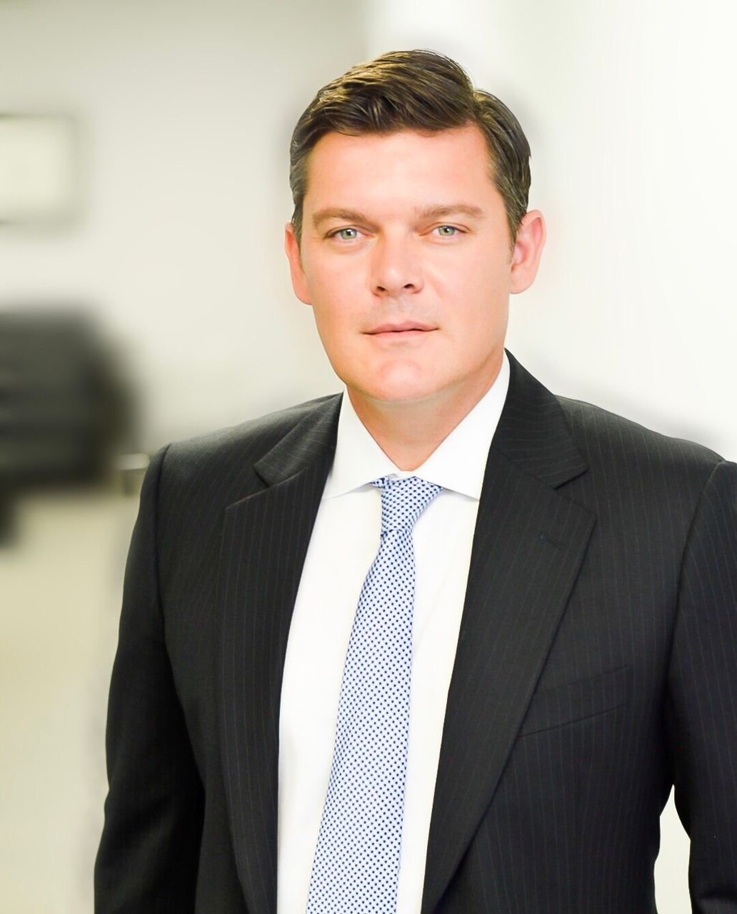 Charlotte Immigration Law Firm : Alex V. Muntean