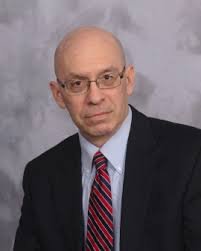 The Kronzek Firm PLC : John English